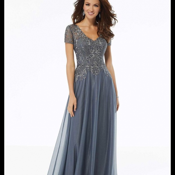 MGNY Dresses & Skirts - Formal beaded grey gown size 16 -never worn-never altered